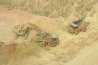 picture of lorries in an open pit mine